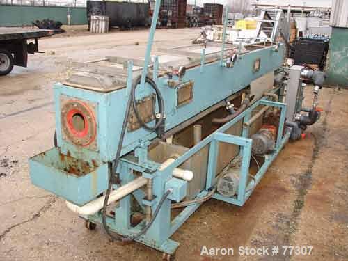 Used OEM Vacuum Sizing Tank, Model OEM VTF, Stainless Steel. 14" wide x 14" deep x 168" long. 3 section with 2 covers. 7-1/2" diameter end openings. Includes holding tank, heat exchanger, 5 hp vacuum...