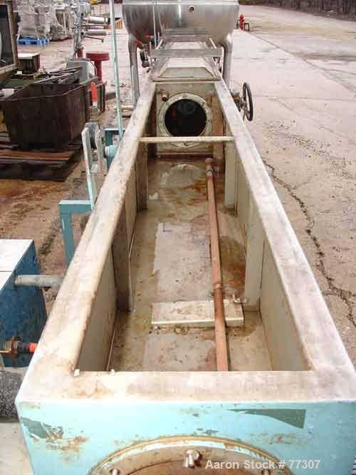 Used OEM Vacuum Sizing Tank, Model OEM VTF, Stainless Steel. 14" wide x 14" deep x 168" long. 3 section with 2 covers. 7-1/2" diameter end openings. Includes holding tank, heat exchanger, 5 hp vacuum...