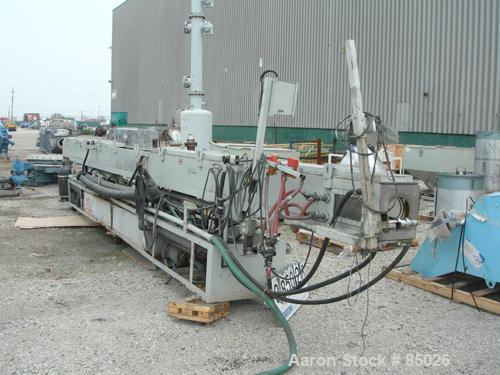 Used RDN Vacuum Sizing Tank, Model 4D-3V-2T-30, 304 Stainless Steel. 11-1/2" wide x 11-1/2" deep x 360" long. Includes holding tank, heat exchanger, pumps, filter and covers. Mounted on a carbon stee...