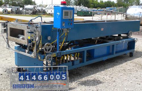 Used RDN Vacuum Calibration Tank, Model 8D-1V-2T-15S, 304 stainless steel. 34" wide x 14-1/2" deep x 192" long. No top covers. Includes holding tank, heat exchanger, centrifugal pumps, and an Allen B...