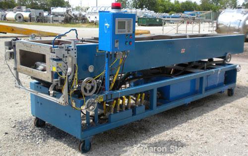 Used RDN Vacuum Calibration Tank, Model 8D-1V-2T-15S, 304 stainless steel. 34" wide x 14-1/2" deep x 192" long. No top covers. Includes holding tank, heat exchanger, centrifugal pumps, and an Allen B...