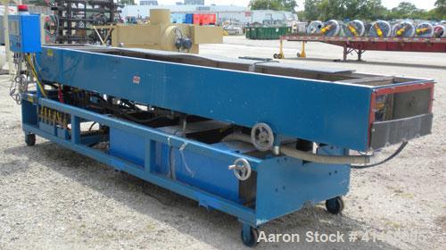 Used RDN Vacuum Calibration Tank, Model 8D-1V-2T-15S, 304 stainless steel. 34" wide x 14-1/2" deep x 192" long. No top covers. Includes holding tank, heat exchanger, centrifugal pumps, and an Allen B...