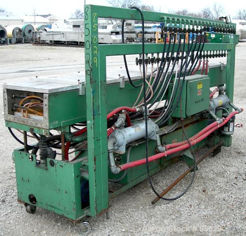 USED: RDN vacuum sizing tank, 304 stainless steel. 20" wide x 9" deep x 12' long. Includes holding tank, heat exchanger, pumps, panel and covers. Mounted on a carbon steel frame.