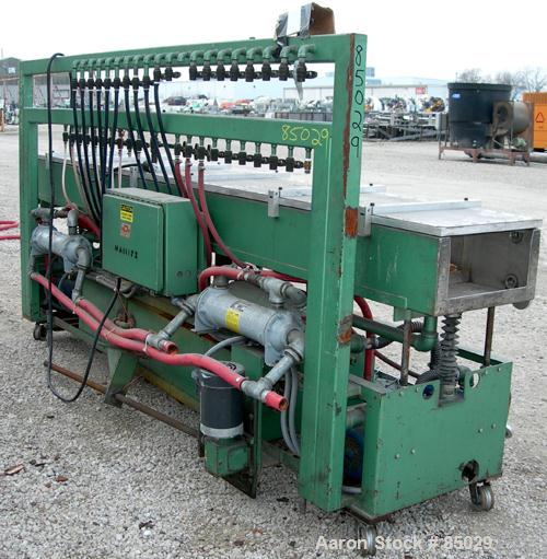 USED: RDN vacuum sizing tank, 304 stainless steel. 20" wide x 9" deep x 12' long. Includes holding tank, heat exchanger, pumps, panel and covers. Mounted on a carbon steel frame.