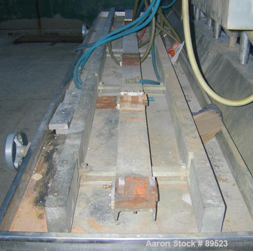 USED: Royal Machine vacuum calibration table, model 009, consisting of (1) 17-1/2" wide x 142" long x 2" deep stainless steel pan. (3) Vacuum pumps, each driven by an approximate 20 hp, 3/60/575 volt...