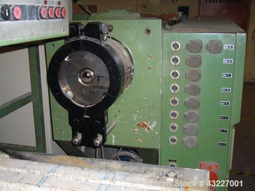 Used Profile Extrusion Line, maximum capacity 242 lbs/hour (110 kg/hour), main motor 76 hp (57 kW).Comprised of:(1) Extruder, Weber DS 6.5, L/D 60-17.(1) Battenfeld K 160 V3 calibration table.(1) Bas...