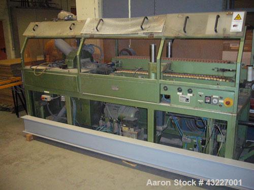Used Profile Extrusion Line, maximum capacity 242 lbs/hour (110 kg/hour), main motor 76 hp (57 kW).Comprised of:(1) Extruder, Weber DS 6.5, L/D 60-17.(1) Battenfeld K 160 V3 calibration table.(1) Bas...
