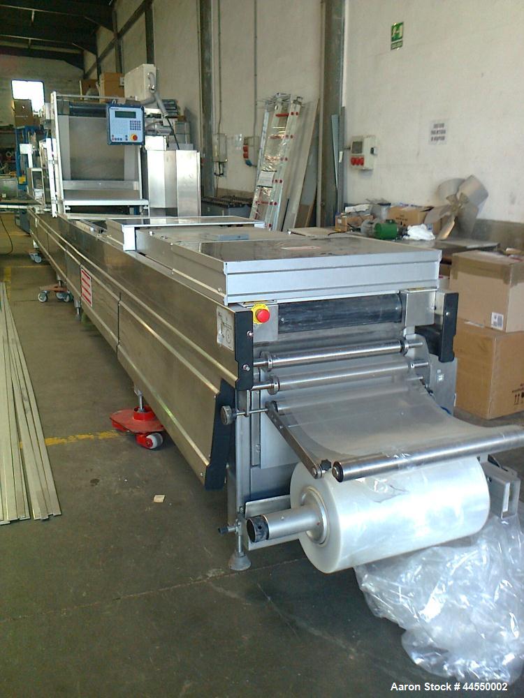 Used-Multivac R570 CD Fully Automatic Roll Stock Thermoformer.  Including molds.  Film width 20.4" (520 mm).  Stainless stee...