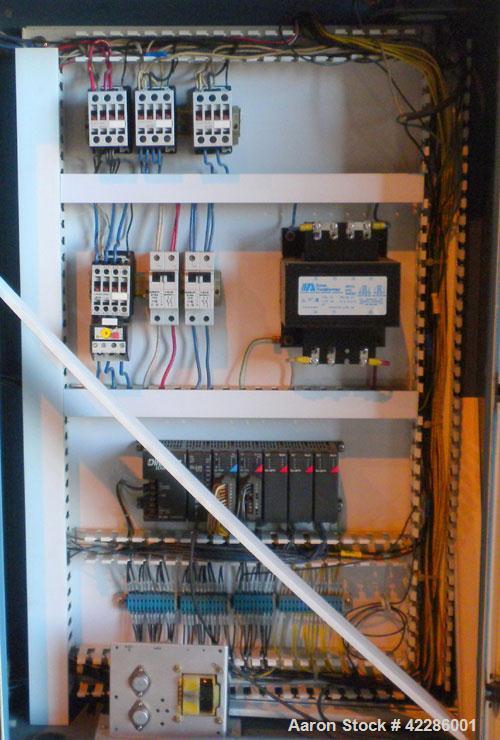 Used ZMD International Shuttle Thermoformer Model V-223. Approximate 24'' x 36'' forming area. Includes an Advantage Sentra 2000HE temperature controller.