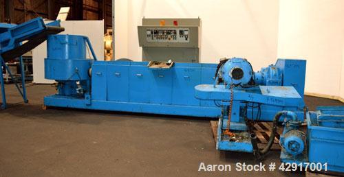 Used Erema Plastic Recycling Plant, Model RM120/35. Consists of (1) Erema model RM120/35 single screw extruder, 4.7’’ (120mm) diameter x 124’’ long screw, approximate 28 to 1 L/D ratio. (10) zone ele...