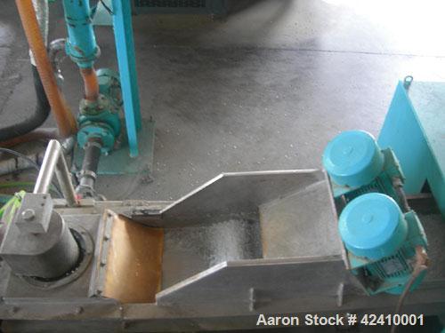 Used Erema RM 70 TVE Plastic Recycling Line. 2.76" (70 mm) diameter single screw extruder with a capacity of 441-551 lbs/hour (200-250 kg/h), with double back flush filtering system, double vented, 3...