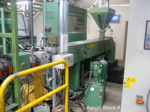 Unused-890 mm wide Welex Coextrusion sheet line. 90 mm main extruder, 50 mm coextruder, 890 x 300 mm rolls, pump group, haul off, 2 station winder, 1990. 90 mm Welex single screw extruder, 30D vented...