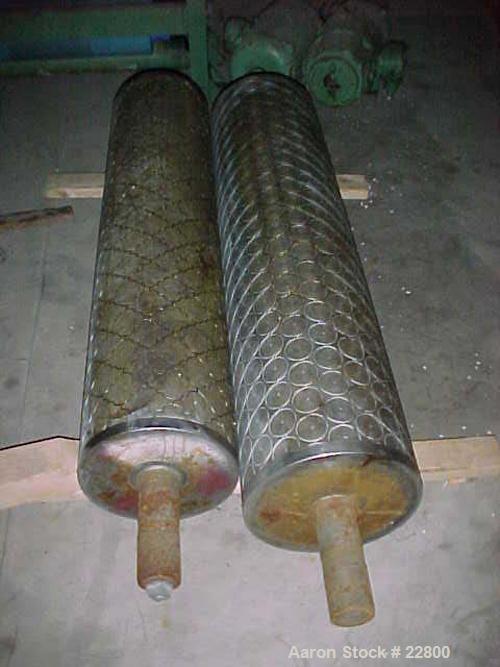 USED: Patterned rolls, 12" dia x 52" long pattern with 54" overall length, plus 3" dia x 8-1/2 " shaft extensions on each side.