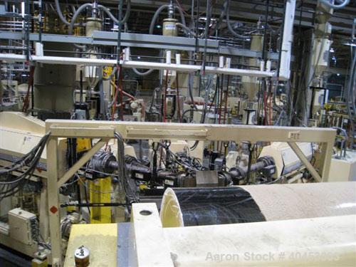 Used PTI (2004) multi layer sheet extrusion line including the following: A) (1) Used PTI model 6000 Trident series 6", 28:1 extruder having a 7-zone electrically heated air cooled barrel at an appro...