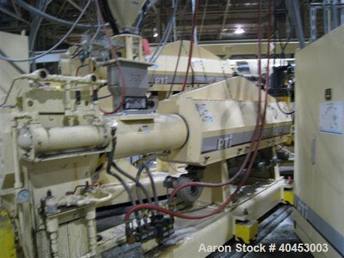 Used PTI (2004) multi layer sheet extrusion line including the following: A) (1) Used PTI model 6000 Trident series 6", 28:1 extruder having a 7-zone electrically heated air cooled barrel at an appro...