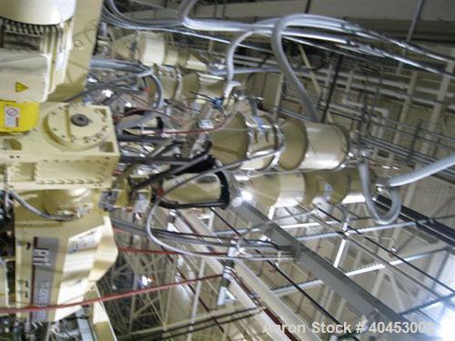 Used PTI (2004) multi layer sheet extrusion line including the following: A) (1) Used PTI model 6000 Trident series 6", 28:1 extruder having a 7-zone electrically heated air cooled barrel at an appro...