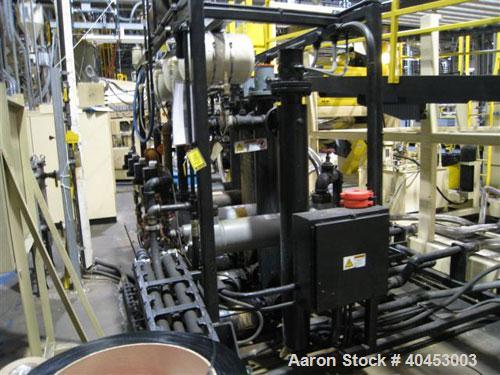 Used PTI (2004) multi layer sheet extrusion line including the following: A) (1) Used PTI model 6000 Trident series 6", 28:1 extruder having a 7-zone electrically heated air cooled barrel at an appro...