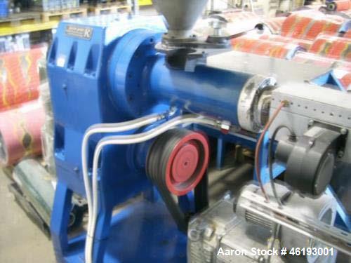 Used Complete Extrusion Line for Flat Sheet PP and PS. Film width up to 850 mm. Film thickness from 0.2 up to 1.5 mm. Consisting of: Kuhne screw diameter 70 mm x 33 D. 4 heating zones, cooling with f...
