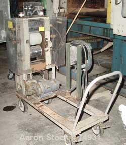 USED: 3 roll sheet stack. (2) 6" diameter x 8" wide chrome plated, (1) 6" diameter x 8" wide metal cored rolls, pneumatically adjustable. Driven by a 1/4 hp DC gearmotor. Includes a Reliance AC-VS dr...