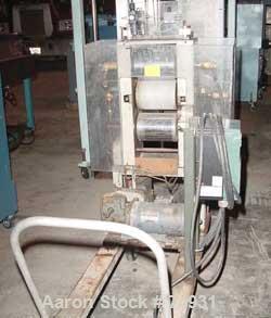 USED: 3 roll sheet stack. (2) 6" diameter x 8" wide chrome plated, (1) 6" diameter x 8" wide metal cored rolls, pneumatically adjustable. Driven by a 1/4 hp DC gearmotor. Includes a Reliance AC-VS dr...