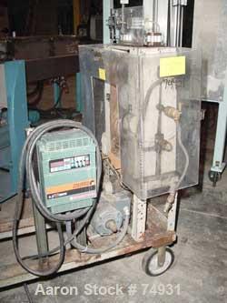 USED: 3 roll sheet stack. (2) 6" diameter x 8" wide chrome plated, (1) 6" diameter x 8" wide metal cored rolls, pneumatically adjustable. Driven by a 1/4 hp DC gearmotor. Includes a Reliance AC-VS dr...
