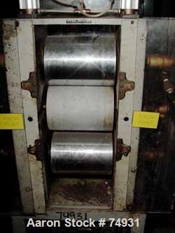 USED: 3 roll sheet stack. (2) 6" diameter x 8" wide chrome plated, (1) 6" diameter x 8" wide metal cored rolls, pneumatically adjustable. Driven by a 1/4 hp DC gearmotor. Includes a Reliance AC-VS dr...