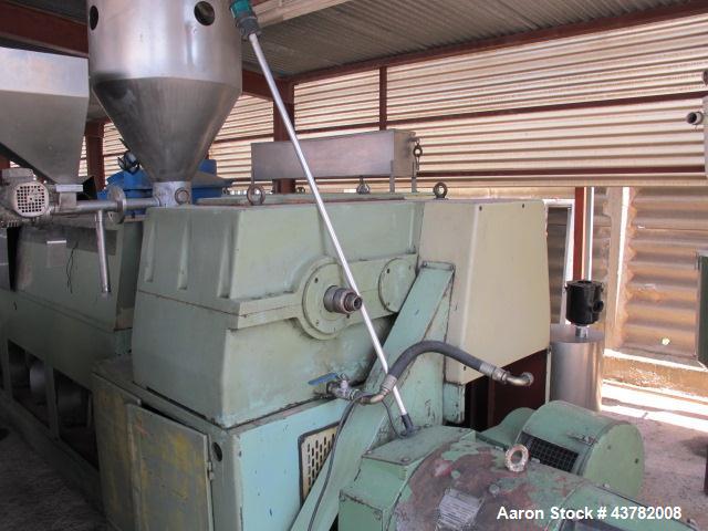 Used Bandera Sheet Manufacturing Line. Comprised of: (1) Bandera extruder model TR-100, 3.9” (100mm) diameter screw, 30 L/D with degasser, 130 HP drive, with filter changer. (1) Bandera co-extruder m...