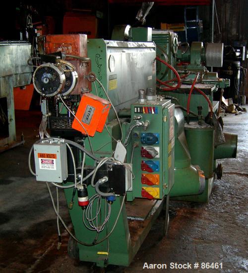 USED: Battenfeld Gloucester 52" wide co-ex sheet line consisting of: (1) Model 244-001 4.5" single screw extruder, approx 30:1 L/D ratio, 5 zone side vented barrel, electrically heated, water cooled,...