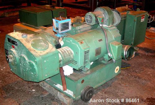USED: Battenfeld Gloucester 52" wide co-ex sheet line consisting of: (1) Model 244-001 4.5" single screw extruder, approx 30:1 L/D ratio, 5 zone side vented barrel, electrically heated, water cooled,...
