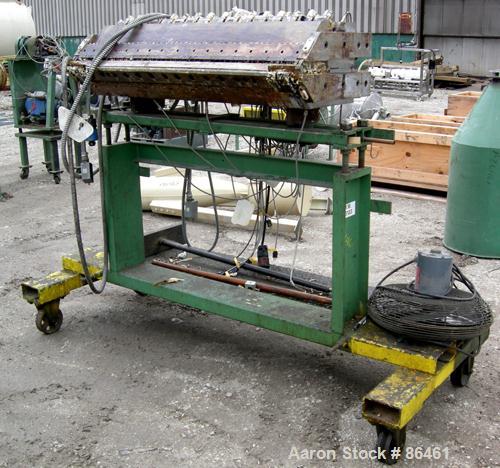 USED: Battenfeld Gloucester 52" wide co-ex sheet line consisting of: (1) Model 244-001 4.5" single screw extruder, approx 30:1 L/D ratio, 5 zone side vented barrel, electrically heated, water cooled,...