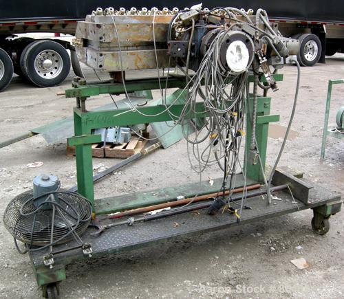 USED: Battenfeld Gloucester 52" wide co-ex sheet line consisting of: (1) Model 244-001 4.5" single screw extruder, approx 30:1 L/D ratio, 5 zone side vented barrel, electrically heated, water cooled,...