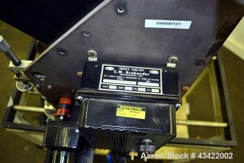 Used C.W. Brabender Univex Lab Take Off. Approximate capacity speeds of up to 30 meters per minute. Consisting of (3) 4” diameter x 8” wide chrome plated, manually adjustable cored rolls, and a top m...