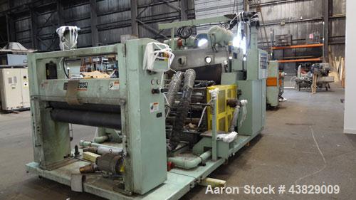Used 3 Roll Chill Roll Stand, Cincinnati Milacron Model Roll Stack Stand, Serial #X70A0100081. 3-Roll vertical chrome polishing roll stack, 18" diameter middle and bottom rolls, 13" diameter top roll...