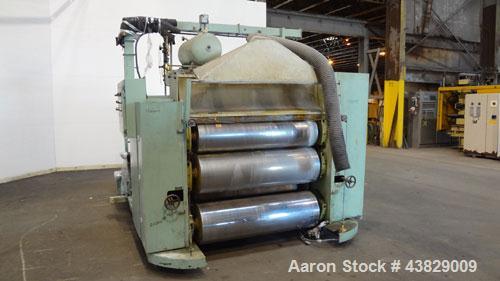 Used 3 Roll Chill Roll Stand, Cincinnati Milacron Model Roll Stack Stand, Serial #X70A0100081. 3-Roll vertical chrome polishing roll stack, 18" diameter middle and bottom rolls, 13" diameter top roll...