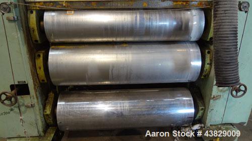 Used 3 Roll Chill Roll Stand, Cincinnati Milacron Model Roll Stack Stand, Serial #X70A0100081. 3-Roll vertical chrome polishing roll stack, 18" diameter middle and bottom rolls, 13" diameter top roll...
