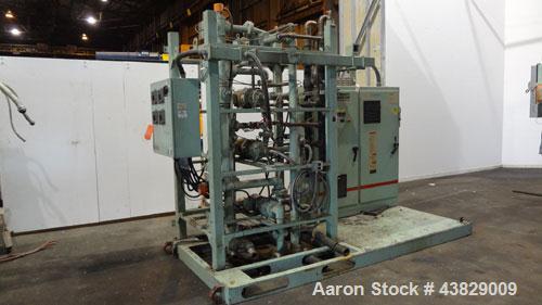 Used 3 Roll Chill Roll Stand, Cincinnati Milacron Model Roll Stack Stand, Serial #X70A0100081. 3-Roll vertical chrome polishing roll stack, 18" diameter middle and bottom rolls, 13" diameter top roll...