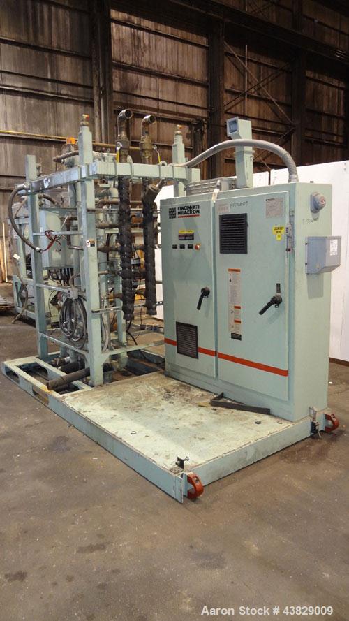 Used 3 Roll Chill Roll Stand, Cincinnati Milacron Model Roll Stack Stand, Serial #X70A0100081. 3-Roll vertical chrome polishing roll stack, 18" diameter middle and bottom rolls, 13" diameter top roll...