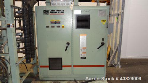 Used 3 Roll Chill Roll Stand, Cincinnati Milacron Model Roll Stack Stand, Serial #X70A0100081. 3-Roll vertical chrome polishing roll stack, 18" diameter middle and bottom rolls, 13" diameter top roll...