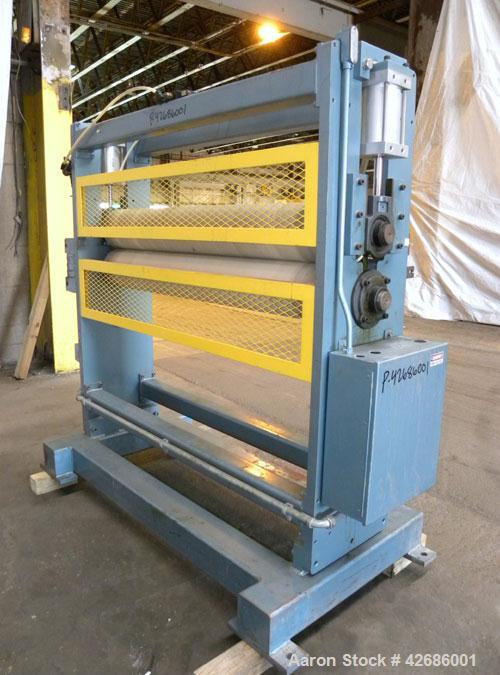 Used Crown Sheet Take Off System Consisting Of: (1) Crown 3 roll vertical down sheet stack. (2) 32'' Diameter x 60'' wide chrome plated cored rolls, (1) 18'' diameter x 60'' wide chrome plated cored ...