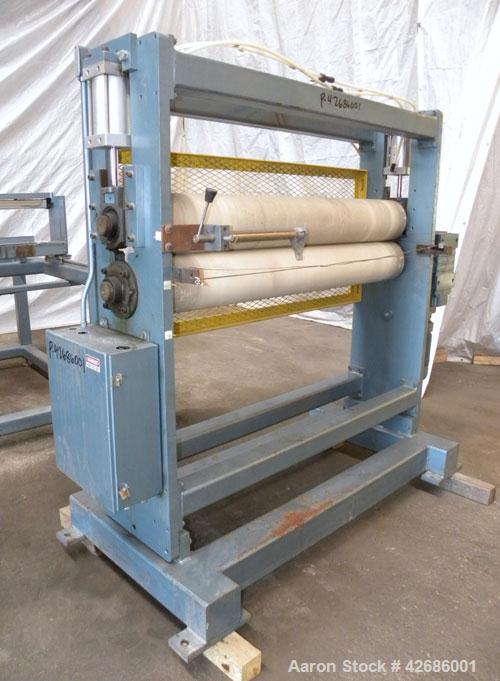 Used Crown Sheet Take Off System Consisting Of: (1) Crown 3 roll vertical down sheet stack. (2) 32'' Diameter x 60'' wide chrome plated cored rolls, (1) 18'' diameter x 60'' wide chrome plated cored ...