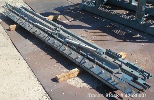 Used Crown Sheet Take Off System Consisting Of: (1) Crown 3 roll vertical down sheet stack. (2) 32'' Diameter x 60'' wide chrome plated cored rolls, (1) 18'' diameter x 60'' wide chrome plated cored ...
