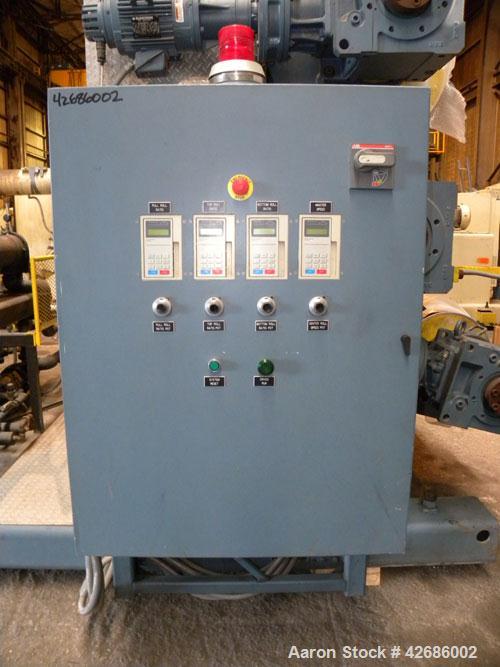 Used Crown Sheet Take Off System Consisting Of: (1) Crown 3 roll "J" sheet stack. (2) 30" Diameter x 60" wide chrome plated cored rolls, (1) 18" diameter x 60" wide movable bottom chrome plated cored...