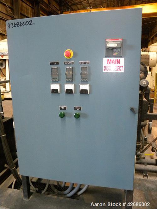 Used Crown Sheet Take Off System Consisting Of: (1) Crown 3 roll "J" sheet stack. (2) 30" Diameter x 60" wide chrome plated cored rolls, (1) 18" diameter x 60" wide movable bottom chrome plated cored...