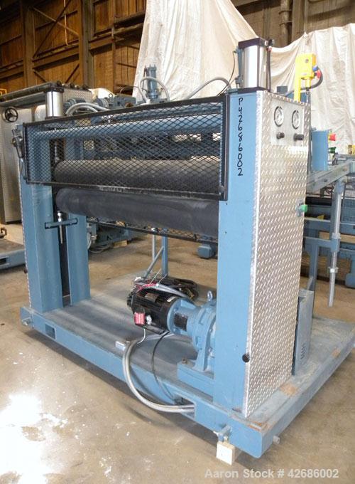 Used Crown Sheet Take Off System Consisting Of: (1) Crown 3 roll "J" sheet stack. (2) 30" Diameter x 60" wide chrome plated cored rolls, (1) 18" diameter x 60" wide movable bottom chrome plated cored...