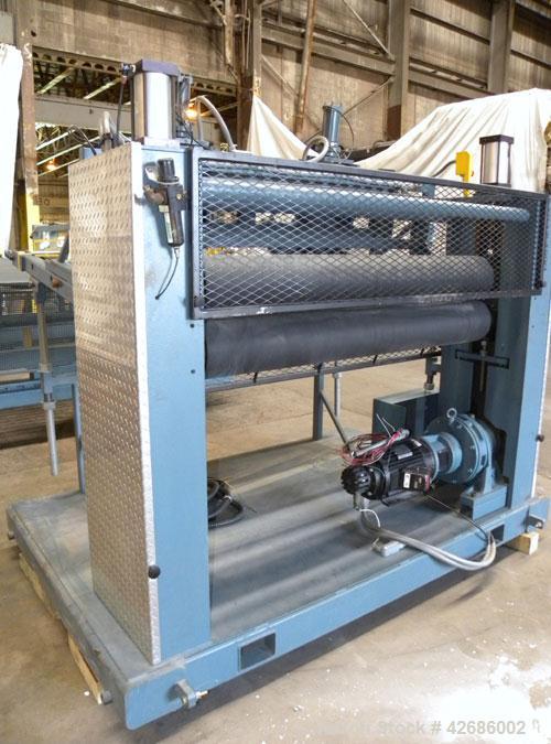 Used Crown Sheet Take Off System Consisting Of: (1) Crown 3 roll "J" sheet stack. (2) 30" Diameter x 60" wide chrome plated cored rolls, (1) 18" diameter x 60" wide movable bottom chrome plated cored...