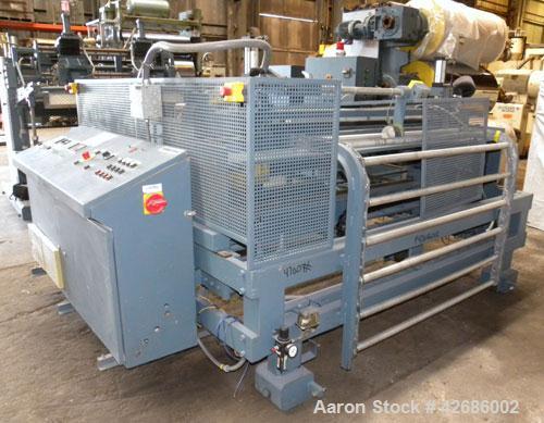 Used Crown Sheet Take Off System Consisting Of: (1) Crown 3 roll "J" sheet stack. (2) 30" Diameter x 60" wide chrome plated cored rolls, (1) 18" diameter x 60" wide movable bottom chrome plated cored...