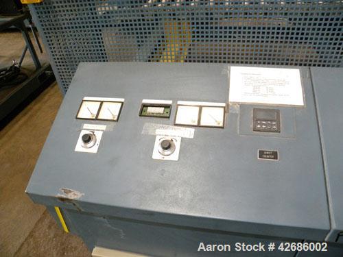 Used Crown Sheet Take Off System Consisting Of: (1) Crown 3 roll "J" sheet stack. (2) 30" Diameter x 60" wide chrome plated cored rolls, (1) 18" diameter x 60" wide movable bottom chrome plated cored...