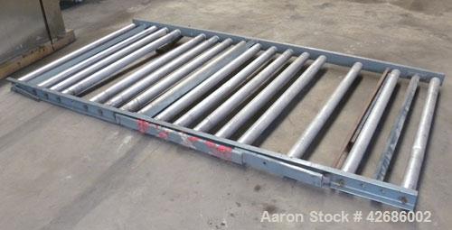 Used Crown Sheet Take Off System Consisting Of: (1) Crown 3 roll "J" sheet stack. (2) 30" Diameter x 60" wide chrome plated cored rolls, (1) 18" diameter x 60" wide movable bottom chrome plated cored...