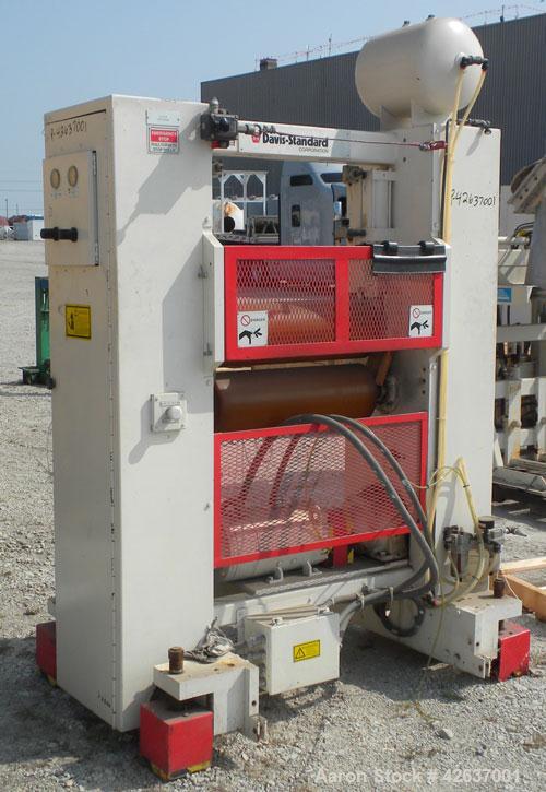 Used Davis Standard 3-Roll Stack. (3) 12’’ Diameter x 24’’ wide chrome matte cored rolls, driven by a 3 hp, 500 volt, 1750/2300 DC motor thru a reducer. Includes approximate 24’’ wide x 150’’ long co...