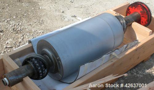Used Davis Standard 3-Roll Stack. (3) 12’’ Diameter x 24’’ wide chrome matte cored rolls, driven by a 3 hp, 500 volt, 1750/2300 DC motor thru a reducer. Includes approximate 24’’ wide x 150’’ long co...